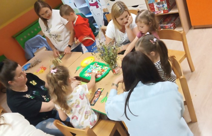 Zajęcia otwarte w Słoneczkach „Z książką poznajemy świat”